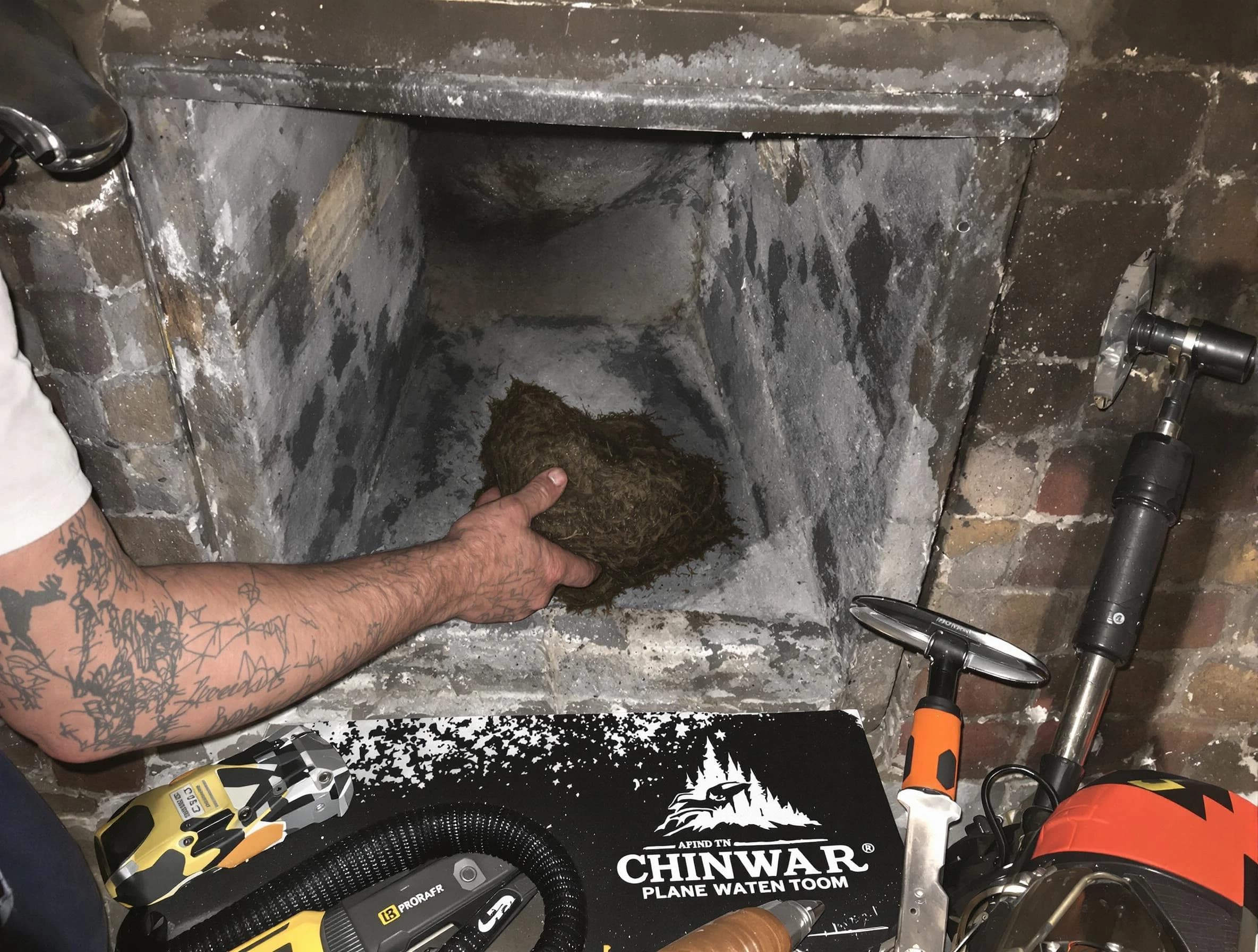 South Brunswick Chimney Sweep safely removing debris and screening chimney in South Brunswick, NJ